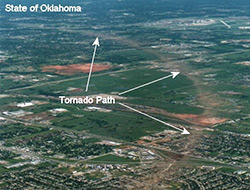Aerial photo showing the path of a tornado