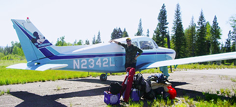 Keaton Surrat with his aircraft, "Mouse"