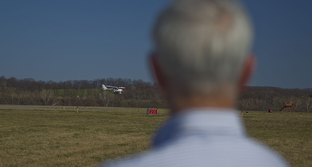 Stickell watches former Marine Sgt. Adam Kisielewski, an Able Flight scholarship winner whom he trained, solo.