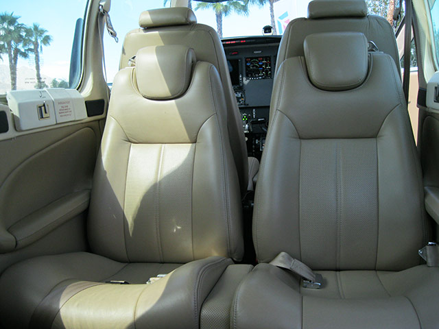 A Baron on display at Airportfest at AOPA Aviation Summit sports a refurbished interior by Aviation Design.