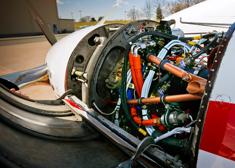 The modified King Air cowl has two air intakes, with the smaller one directed to an oil cooler.