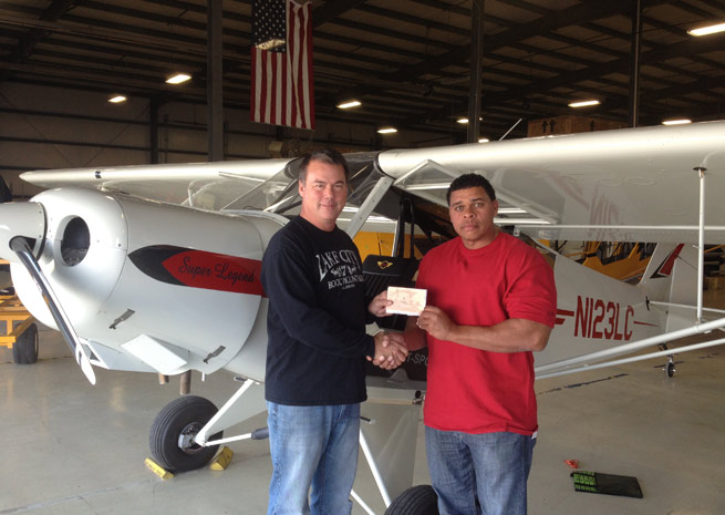 Darin Hart of American Legend Aircraft accepts FAA Super Legend.