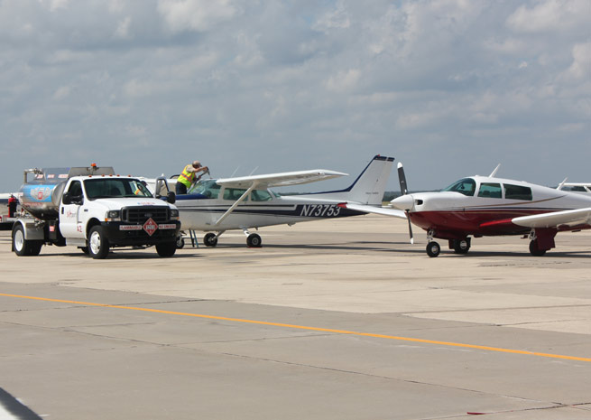 Aircraft stream in for Redbird's $1-per-gallon avgas deal.