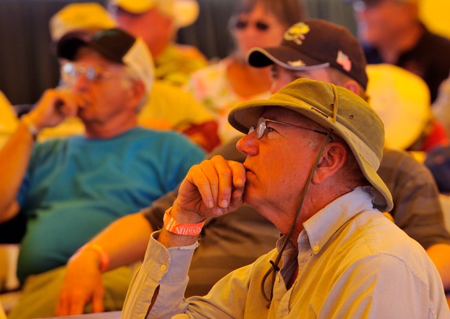 Pilots listen to a seminar about portable ADS-B in the AOPA forum tent.