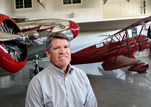 Les Whittlesey and two of his airplanes in his Cal-Aero complex.