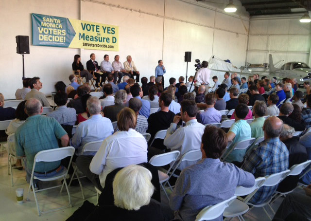 A crowd of Santa Monica Airport supporters gather to learn about a ballot measure in November that could help save the airport.