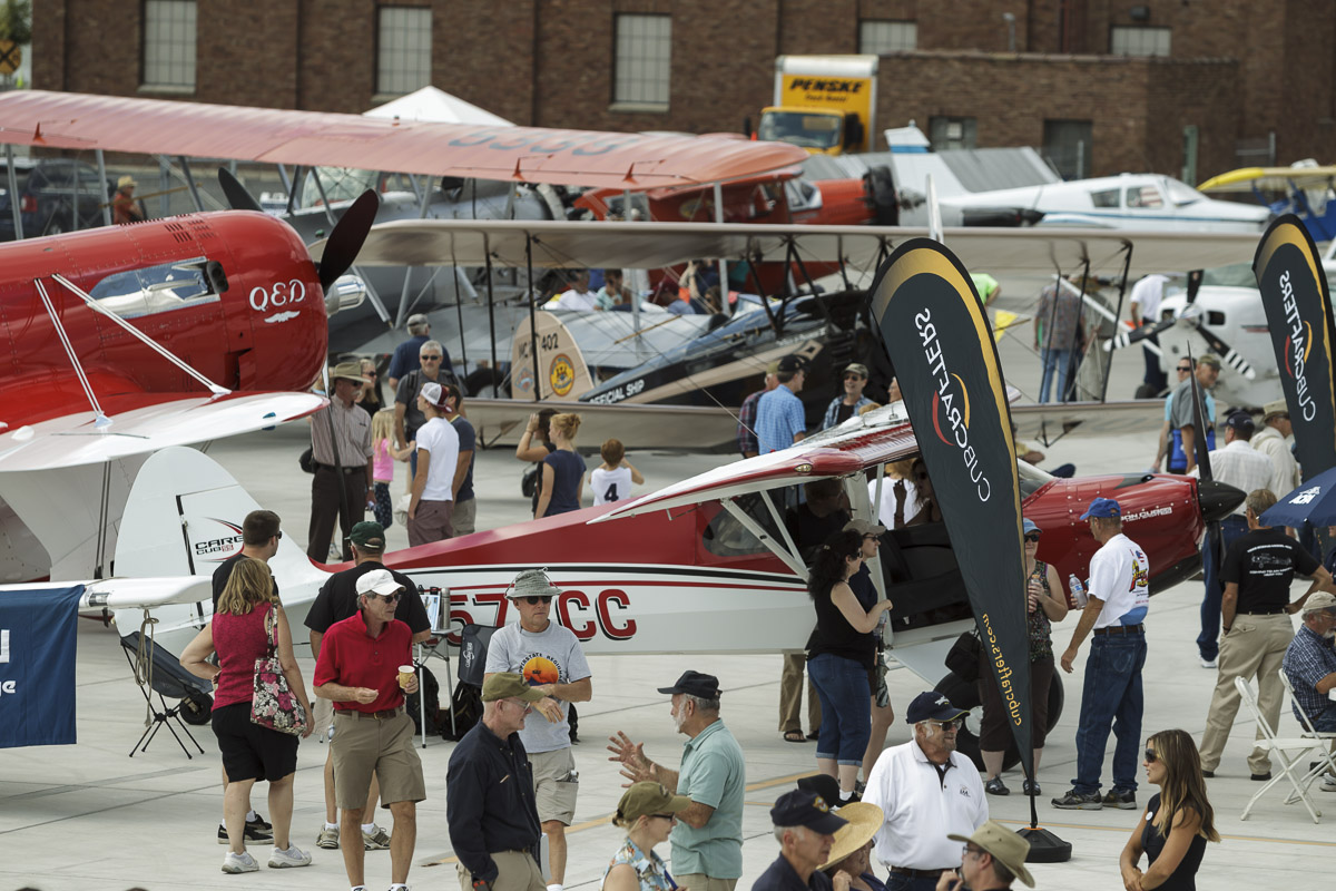 Pilots enjoy the CubCrafters display.