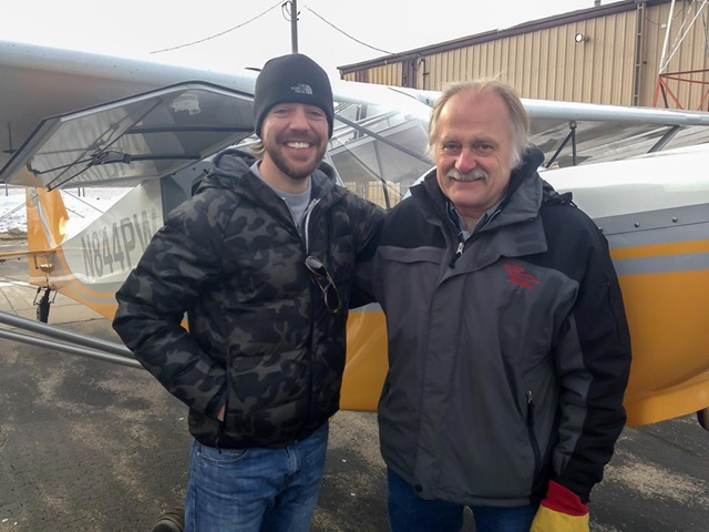 Jared Birkholz (left) soloed on Dec. 7. He is shown with his CFI, Richard Merkley.