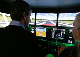 Whitaker got an introduction to AOPA’s Redbird FMX aviation training device while at AOPA headquarters.