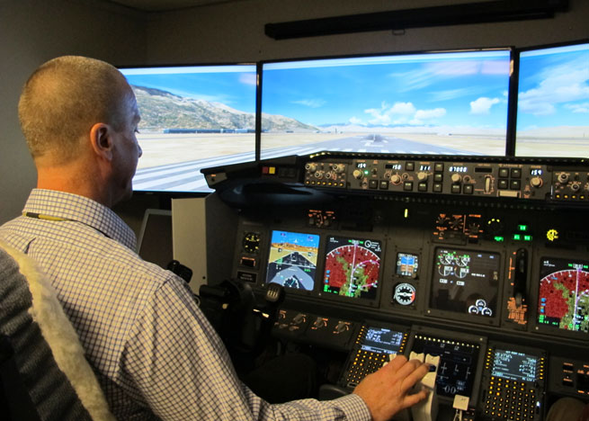 Honeywell’s Steve Johnson demonstrated the company's takeoff performance monitor technology in a simulator.