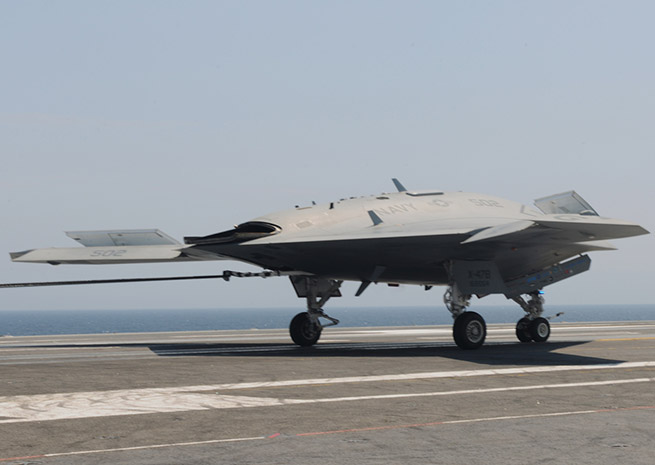 The X-47B developed by Northrop-Grumman (and powered by Pratt & Whitney’s PurePower Geared Turbofan engine) made history in July with the first aircraft carrier operations by an unmanned vehicle. U.S. Navy photo.