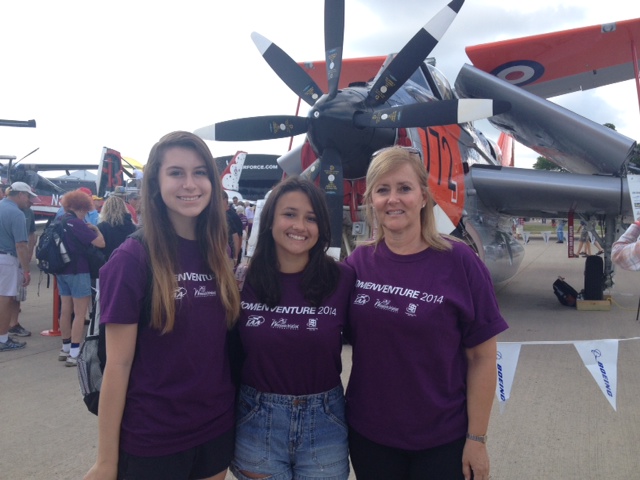 Halle Shopperly (left),Amelia Brennan (center), and Deb Marshall joined hundreds of women at EAA AirVenture to participate in a group photo of women pilots.