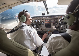 Kenya Wildlife Service pilots prepare to start the agency’s Caravan, the largest of 11 aircraft operated by the service dedicated to conservation and wildlife protection.