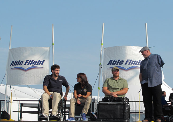 Able Flight honored Tim Klemm, Ellen Howards, Curtis Stanley, and Jason Gibson with wings after they earned their sport pilot certificates through the group's training program with Purdue University.