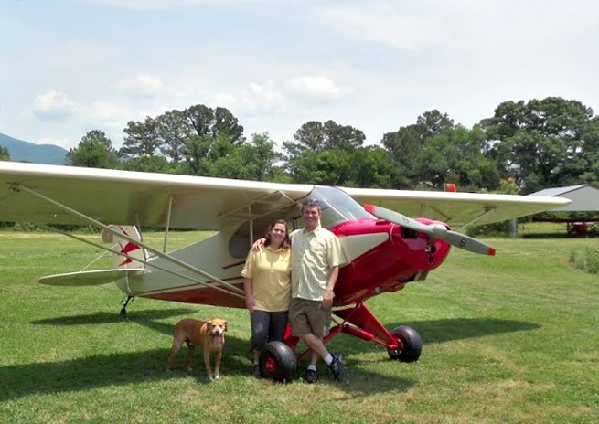 April and Chris Nesin with their restored Cub.