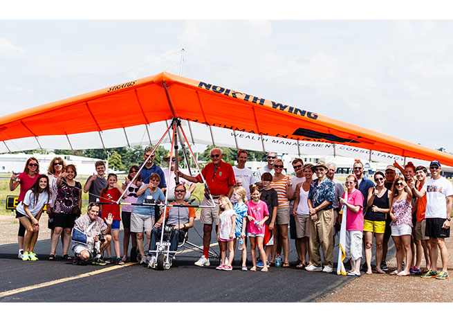 A crowd surrounded Gary Davis following completion of his June 21 flight into history. Photo by Deborah Meadows.