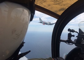 View from the cockpit, flying formation over Cape Cod Bay. Photo by Rhon Manor.
