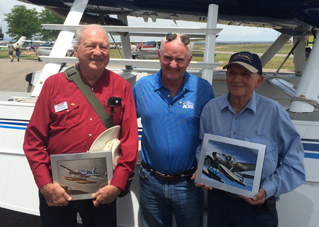 AOPA President Mark Baker recognizes long-serving AOPA members Clyde Osborn (left) and Bill Betts (right).