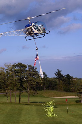 Ball drops conducted on behalf of charitable organizations have proved to be a helpful sideline for helicopter operators. Photo courtesy of Ryan Rotors. 