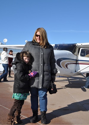 Esther Harbin and her mother, Susan Gray, got an aerial view of their hometown during the flight.