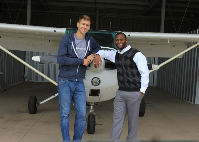 Rodney McKnight (right), winner of the 2013 Ceci Stratford Flight Training Scholarship, passed his checkride March 3. Shown here with CFI Jason Schappert.