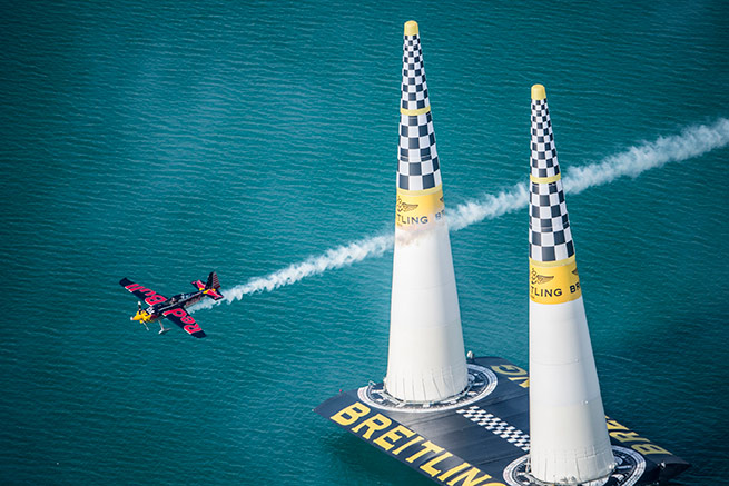 Kirby Chambliss of the United States performs during the race for the first stage of the Red Bull Air Race World Championship in Abu Dhabi, United Arab Emirates, on March 1, 2014. Photo by Balazs Gardi/Red Bull Content Pool.