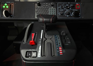Single power lever controls thrust and also serves as a condition lever. There's no propeller lever because prop rpm is maintained by an electric governor. Photo courtesy Daher-Socata.