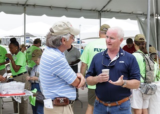 AOPA President Mark Baker chats during the AOPA Fly-In in San Marcos, Texas, April 26.