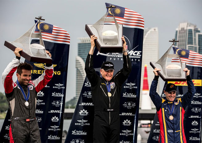 From left, Hannes Arch, Nigel Lamb, and Matt Hall share the Red Bull Air Race podium in Malaysia. Photo by Samo Vidic, courtesy of Red Bull.