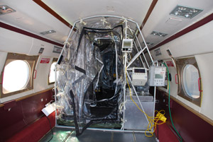 An airborne biomedical containment system allows Phoenix Air Group to transport Ebola patients.