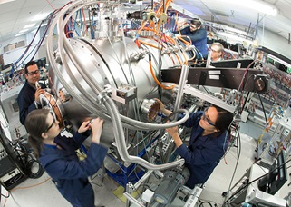 The compact fusion team works on a suite of diagnostics to measure the properties of the plasma confinement. Eric Schulzinger photo courtesy of Lockheed Martin Corporation.