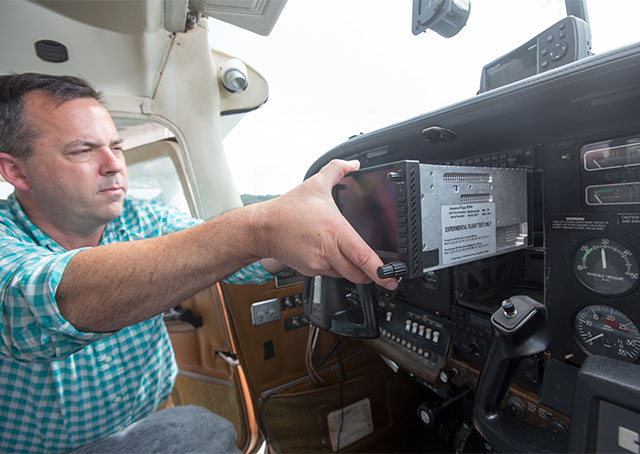 Avidyne Vice President of Product Management Steve Jacobson can swap a Garmin GNS 530 for an Avidyne IFD 540 in seconds, a process the company hopes will be repeated often. 