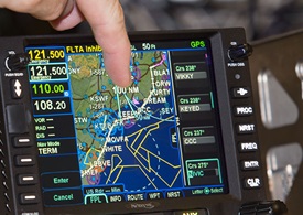 The IFD 540 has a touch screen interface that allows a flight plan to be amended by holding and dragging legs to new waypoints. 