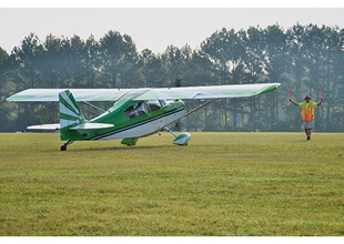 A volunteer parks an early morning arrival Sept. 6.