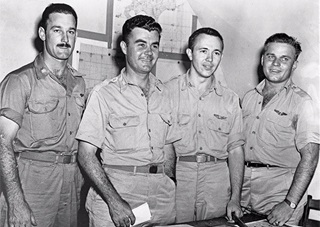 Officers of the Enola Gay: (left to right) Major Thomas W. Ferebee, bombardier; Col. Paul W. Tibbets, Jr., pilot; Capt. Theodore J. “Dutch” Van Kirk, navigator; and Capt. Robert Lewis, co-pilot. Photo from the National Air and Space Museum Archives, Smithsonian Institution.