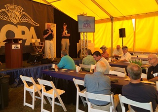 Air Safety Institute Senior Vice President George Perry (left) and AOPA Foundation Executive Director Jim Minow (right) thank pilots for supporting AOPA's initiatives.