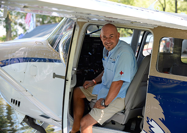 Pilot Mark Palm first had to acquire his A&P certification before he could follow his dream of helping Sepik River villagers in Papua. New Guinea. Photo by David Tulis/AOPA.