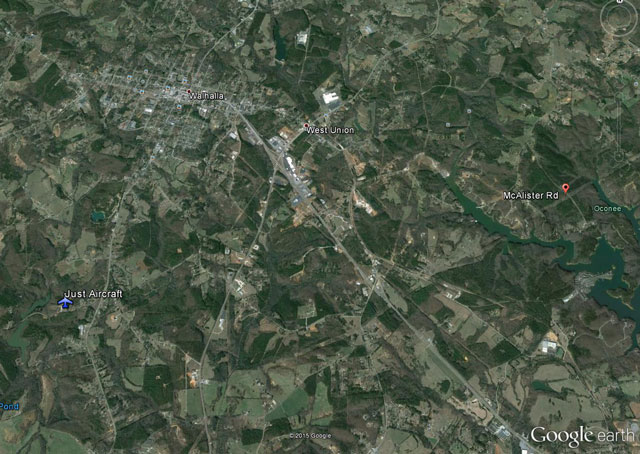 This Google Earth view shows the Just Aircraft factory at lower left, and McAlister Road (about 4 nautical miles away) at right.
