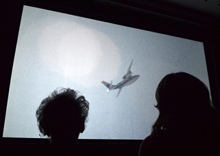 National Aviation Day participants view "Flying the feathered Edge: The Bob Hoover Project." Photo by David Tulis/AOPA.