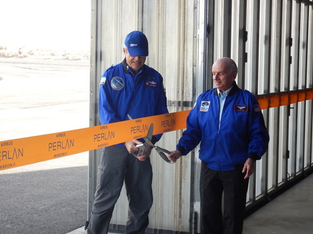 Perlan Project II chief pilot Jim Payne and sponsor Dennis Tito cut the ribbon to welcome the team to Nevada and to open flight testing of the Perlan 2 high-altitude sailplane. Photo courtesy of Dale Brown.