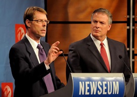 GAMA Chairman Joe Brown makes a point as CEO Pete Bunce listens.