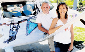 Janet Rowse and Ron Cuff of SafeLaunch with the Cessna 182. Photo courtesy of SafeLaunch.