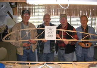 The last of 248 “full-sized” ribs, signed by the builders (left to right) Hank Hendrickson, Lee Sanislo, Keith Murphy, Fred Hazelton