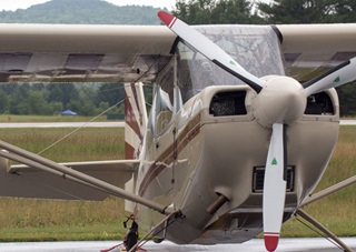 The Super Decathlon waits on the ramp for better weather. Part of the challenge of competition aerobatics is keeping the mind sharp during long waits between flights.