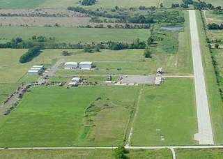 South Grand Lake Regional Airport in Ketchum, Oklahoma was a grass strip in 2005 (below) and now sports a paved runway (2014 view above) thanks to volunteers and donations. Photos courtesy of Brent Howard. 