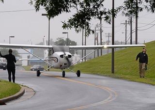 AOPA's Cessna 172 taxis down Aviation Way June 4 to get a prime position in the display area for AOPA's Homecoming Fly-In. Photo by David Tulis.