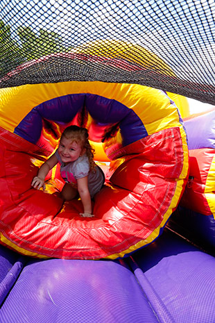 Who knew an airport could be so fun? If only they all had inflatable bounce houses! Photo by Chris Rose.