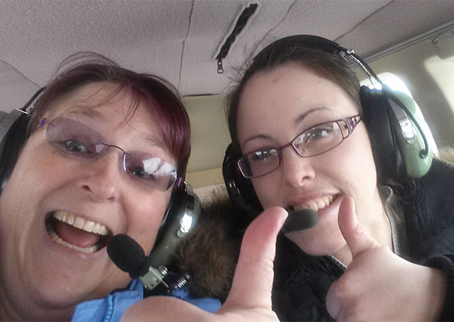 Mothers and daughters were particularly encouraged to take part in the Fly It Forward Challenge, submitting many photos like this one for an online contest. Photo courtesy of Mireille Goyer/ Institute for Women Of Aviation Worldwide