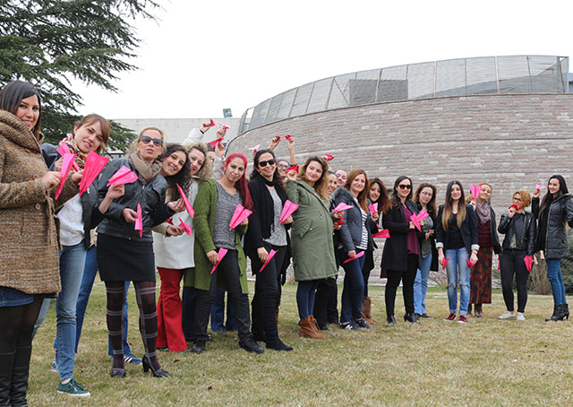 The Pink Paper Plane Challenge called on participants to fold themselves an airplane, inscribe a dedication, and launch en masse, as this group of employees of of BITES Aerospace & Defence did in Turkey. Photo courtesy of Mireille Goyer/ Institute for Women Of Aviation Worldwide
