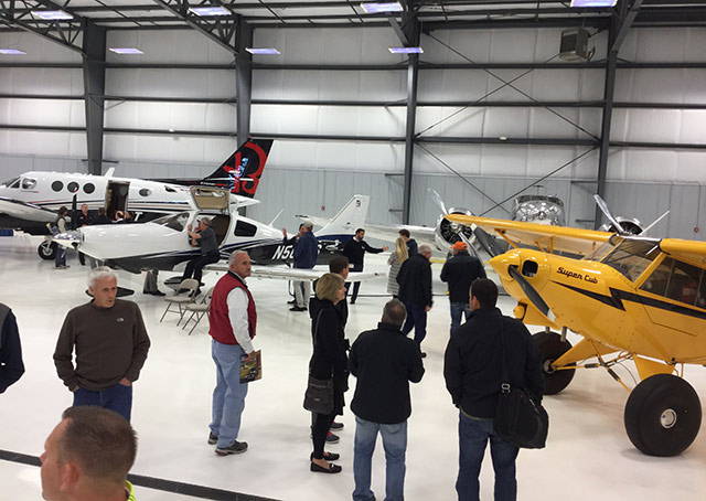 Attendees check out some of the aircraft on display.